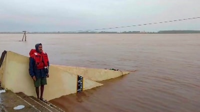 The swollen Godavari river following incessant rains, in Telangana’s Jagital. (PTI) The swollen Godavari river following incessant rains, in Telangana’s Jagital. (PTI)