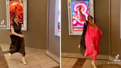 The image shows a woman wearing a special dress while going to watch Barbie and Oppenheimer. (Twitter/@hottoiletwater) The image shows a woman wearing a special dress while going to watch Barbie and Oppenheimer. (Twitter/@hottoiletwater)
