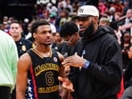 Bronny James (L), the eldest son of NBA superstar LeBron James, is in a stable condition after suffering a cardiac arrest during a practice with his college basketball team Bronny James (L), the eldest son of NBA superstar LeBron James, is in a stable condition after suffering a cardiac arrest during a practice with his college basketball team