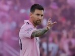 Lionel Messi gestures towards David Beckham after the goal Lionel Messi gestures towards David Beckham after the goal