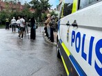 Police stand guard near the Iraqi embassy ahead of a demonstration in Stockholm, Sweden.