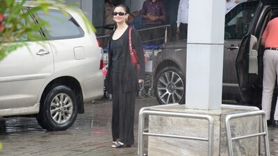 Alia Bhatt's all-black outfit is all about opting for comfort over style. The star's airport looks generally focus on the same aesthetic, making them fully steal-worthy and easily adaptable. Coming to this look, Alia wore a simple black T-shirt featuring a plunging neckline and a figure-skimming silhouette. (Instagram) Alia Bhatt's all-black outfit is all about opting for comfort over style. The star's airport looks generally focus on the same aesthetic, making them fully steal-worthy and easily adaptable. Coming to this look, Alia wore a simple black T-shirt featuring a plunging neckline and a figure-skimming silhouette. (Instagram)