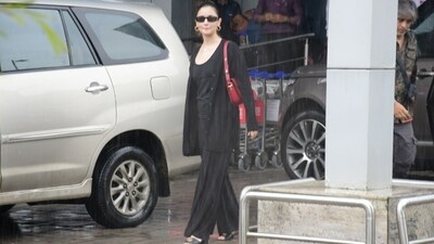 Alia glammed up the simple all-black airport look by going for minimal yet striking accessories. Since Alia is the Global Ambassador of the luxury label, she chose all Gucci accessories, including a red Gucci Horsebit 1955 shoulder bag, black tinted futuristic sunglasses, and black patterned leather block heels with GG embellished Gold logo. (Instagram) Alia glammed up the simple all-black airport look by going for minimal yet striking accessories. Since Alia is the Global Ambassador of the luxury label, she chose all Gucci accessories, including a red Gucci Horsebit 1955 shoulder bag, black tinted futuristic sunglasses, and black patterned leather block heels with GG embellished Gold logo. (Instagram)
