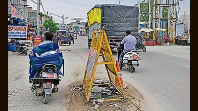 Damaged road in Rohan road in Ludhiana on Wednesday. (HT Photo) Damaged road in Rohan road in Ludhiana on Wednesday. (HT Photo)