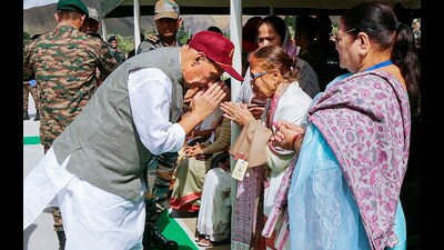 Defence minister Rajnath Singh interacts with the war Heroes, Veer Naris and the families of Bravehearts at Kargil War Memorial on the occasion of Kargil Vijay Diwas, in Drass, Ladakh on Wednesday. (PTI) Defence minister Rajnath Singh interacts with the war Heroes, Veer Naris and the families of Bravehearts at Kargil War Memorial on the occasion of Kargil Vijay Diwas, in Drass, Ladakh on Wednesday. (PTI)