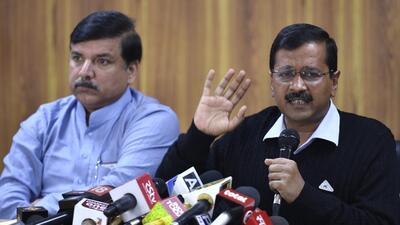 Delhi chief minister Arvind Kejriwal (right) with AAP MP Sanjay Singh. (HT File Photo)