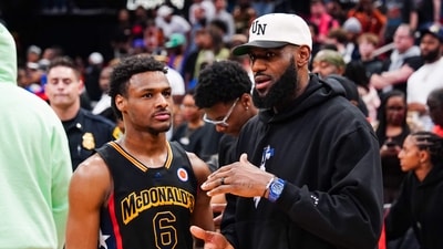Bronny James (L), the eldest son of NBA superstar LeBron James, is in a stable condition after suffering a cardiac arrest during a practice with his college basketball team (AFP)