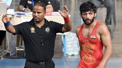 Vishal Kaliraman (red) won the men's 65kg trials for the Asian Games. (Sanjeev Verma/HT) Vishal Kaliraman (red) won the men's 65kg trials for the Asian Games. (Sanjeev Verma/HT)