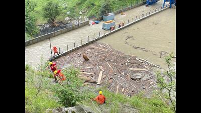 National Disaster Response Force Rescuers at the Mandala dam on Wednesday. (HT photo) National Disaster Response Force Rescuers at the Mandala dam on Wednesday. (HT photo)