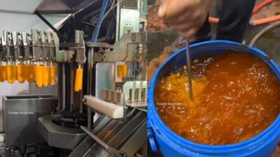 Snapshot of how orange popsicles are made in a factory. (Instagram/@foodieincarnate) Snapshot of how orange popsicles are made in a factory. (Instagram/@foodieincarnate)