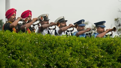 Tri-Services band performs at the National War Memorial on the occasion of Kargil Vijay Diwas in Delhi. (PTI) Tri-Services band performs at the National War Memorial on the occasion of Kargil Vijay Diwas in Delhi. (PTI)