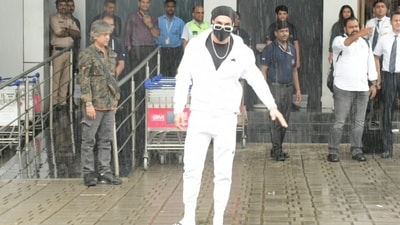 Ranveer accessorised the outfit with a black beanie, white socks, black-and-white slip-on sandals, a sleek chain, matching nerdy glasses, and a face mask. Meanwhile, directed by Karan Johar, Rocky Aur Rani Kii Prem Kahaani releases on July 28. (Instagram) Ranveer accessorised the outfit with a black beanie, white socks, black-and-white slip-on sandals, a sleek chain, matching nerdy glasses, and a face mask. Meanwhile, directed by Karan Johar, Rocky Aur Rani Kii Prem Kahaani releases on July 28. (Instagram)