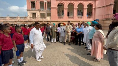 The minister took stock of maintenance of the historic building besides visiting the class rooms and museum . (HT Photo)