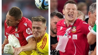 Paul Mullin (in red) during a collision with United keeper Nathan Bishop Paul Mullin (in red) during a collision with United keeper Nathan Bishop