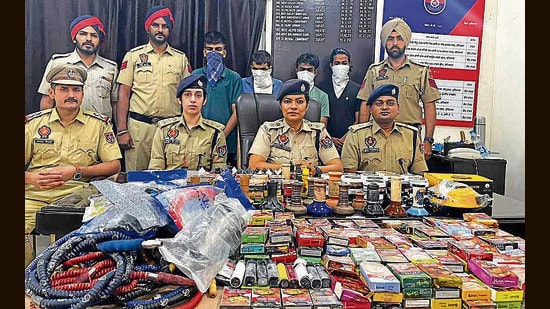 Accused of serving hookahs among the people despite a ban in the custody of Division number 5 police in Ludhiana. (HT Photo)