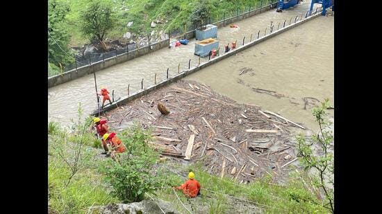 National Disaster Response Force Rescuers at the Mandala dam on Wednesday. (HT photo)