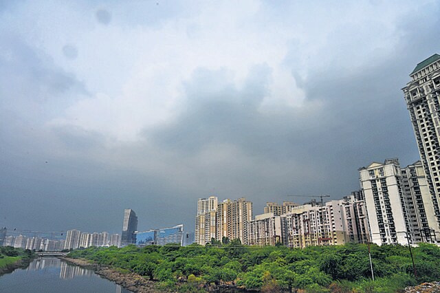 Dark clouds above Gautam Budh Nagar near Sector 137 on Tuesday. (Sunil Ghosh/HT Photo) Dark clouds above Gautam Budh Nagar near Sector 137 on Tuesday. (Sunil Ghosh/HT Photo)