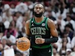 Boston Celtics guard Jaylen Brown (7) dribbles the ball during Game 3 of the NBA basketball playoffs Eastern Conference finals against the Miami Heat,