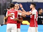 Arsenal's Leandro Trossard (C) celebrates scoring his team's fourth goal during a pre-season friendly against Barcelona