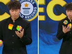 The image shows a man from China solving three Rubik’s Cubes while juggling them. The image shows a man from China solving three Rubik’s Cubes while juggling them.