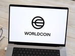 The Worldcoin logo on a laptop arranged in Germantown, New York, US, on Monday, July 24, 2023. Worldcoin, the digital identity and crypto payments project co-founded by OpenAI Chief Executive Officer Sam Altman, launched on Monday. Photographer: Gabby Jones/Bloomberg
