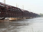 A view of the Yamuna river as its water level rises after water being released from Hathni Kund barrage due to heavy rainfall. A view of the Yamuna river as its water level rises after water being released from Hathni Kund barrage due to heavy rainfall.