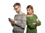 Whether you are phubbing your partner at teatime or bedtime, you are surely making yourself emotionally distant from them.(Freepik)