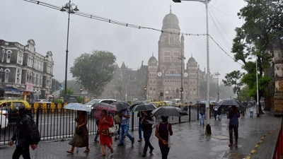 People were seen walking and holding umbrellas as the city received heavy rainfall at the CST area, in Mumbai. (Photo by Bhushan Koyande/HT Photo) People were seen walking and holding umbrellas as the city received heavy rainfall at the CST area, in Mumbai. (Photo by Bhushan Koyande/HT Photo)