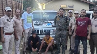 Assam Police personnel after the arrests in Cachar on Wednesday. (Twitter Photo) Assam Police personnel after the arrests in Cachar on Wednesday. (Twitter Photo)