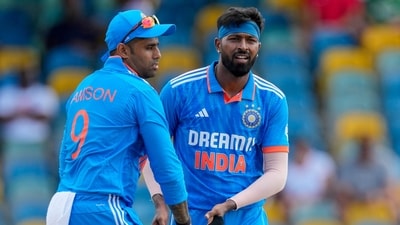 India's Hardik Pandya (Right) celebrates with Suryakumar Yadav, the dismissal of West Indies' Kyle Mayers during their 1st ODI. (AP) India's Hardik Pandya (Right) celebrates with Suryakumar Yadav, the dismissal of West Indies' Kyle Mayers during their 1st ODI. (AP)