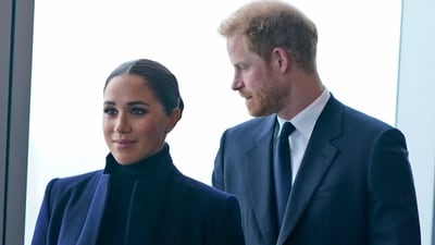 FILE - Meghan Markle, and her husband Prince Harry arrive to the observatory in One World Trade in New York, Thursday, Sept. 23, 2021. After months of speculation about whether they would be invited to the coronation, the palace announced that Harry would attend but Meghan would remain in California with their two children. (AP) FILE - Meghan Markle, and her husband Prince Harry arrive to the observatory in One World Trade in New York, Thursday, Sept. 23, 2021. After months of speculation about whether they would be invited to the coronation, the palace announced that Harry would attend but Meghan would remain in California with their two children. (AP)