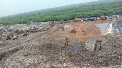 Gurugram, India-July 26, 2023: The site, where will be built a waste to energy plant in waste treatment plant in Bandhwari at Gurugram-Faridabad road near toll plaza; the waste collection concessionaire Ecogreen Energy has alleged that the 10 acre land allotted by MCG for waste to energy plant at Bandhwari. MCG has again started dumping waste on the site designated for the WTE plant, in Gurugram, India, on Wednesday, 26 July 2023. (Photo by Parveen Kumar/Hindustan Times)(Pic to go with Leena Dhankar's story) Gurugram, India-July 26, 2023: The site, where will be built a waste to energy plant in waste treatment plant in Bandhwari at Gurugram-Faridabad road near toll plaza; the waste collection concessionaire Ecogreen Energy has alleged that the 10 acre land allotted by MCG for waste to energy plant at Bandhwari. MCG has again started dumping waste on the site designated for the WTE plant, in Gurugram, India, on Wednesday, 26 July 2023. (Photo by Parveen Kumar/Hindustan Times)(Pic to go with Leena Dhankar's story)