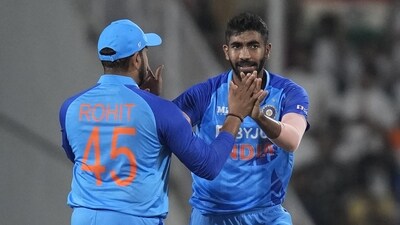 India's Jasprit Bumrah, right, celebrates with captain Rohit Sharma after the dismissal of Australia's captain Aaron Finch (AP) India's Jasprit Bumrah, right, celebrates with captain Rohit Sharma after the dismissal of Australia's captain Aaron Finch (AP)