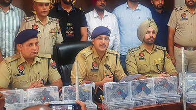 Mohali SSP Sandeep Kumar Garg giving details of the arrests at a press conference on Thursday. (HT Photo)