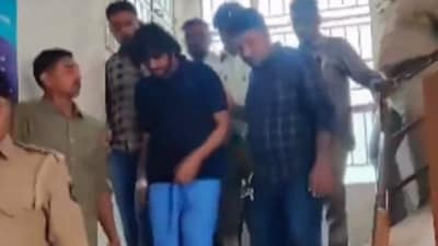 Tathya Patel (centre) was taken into juducual custody (PTI Photo) Tathya Patel (centre) was taken into juducual custody (PTI Photo)