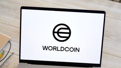 The Worldcoin logo on a laptop arranged in Germantown, New York, US, on Monday, July 24, 2023. Worldcoin, the digital identity and crypto payments project co-founded by OpenAI Chief Executive Officer Sam Altman, launched on Monday. Photographer: Gabby Jones/Bloomberg (Bloomberg) The Worldcoin logo on a laptop arranged in Germantown, New York, US, on Monday, July 24, 2023. Worldcoin, the digital identity and crypto payments project co-founded by OpenAI Chief Executive Officer Sam Altman, launched on Monday. Photographer: Gabby Jones/Bloomberg (Bloomberg)