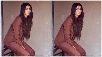 In golden hoop earrings, golden bracelet, open tresses and minimal makeup, Karishma slayed formal fashion goals for the midweek. (Instagram/@karishmaktanna) In golden hoop earrings, golden bracelet, open tresses and minimal makeup, Karishma slayed formal fashion goals for the midweek. (Instagram/@karishmaktanna)