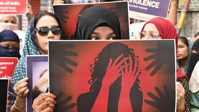 Members of Purple Foundation, an NGO, staged a silent protest against violence against women in Manipur. (Photo by Samir Jana/ Hindustan Times) Members of Purple Foundation, an NGO, staged a silent protest against violence against women in Manipur. (Photo by Samir Jana/ Hindustan Times)