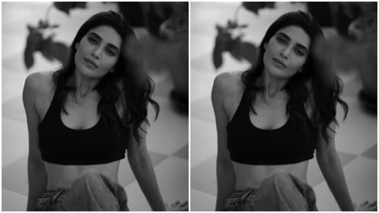 Karishma kept it minimal in a black cropped tank top and a pair of denims as she sat on the floor and posed for the cameras.&nbsp;(Instagram/@karishmaktanna)