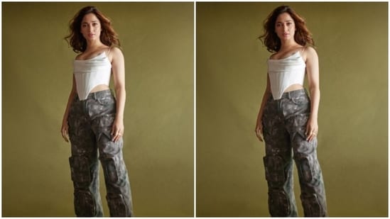 Tamannaah wore her tresses open in wavy curls and decked up in nude eyeshadow, mascara-laden eyelashes, feathered eyebrows, contoured cheeks and a shade of nude lipstick.&nbsp;(Instagram/@tamannaahspeaks)