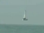 Optical illusion of a boat 'flying.'