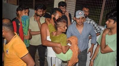 A patient being evacuated after a fire broke out at BRD Medical College in Gorakhpur, Thursday night. (PTI Photo) A patient being evacuated after a fire broke out at BRD Medical College in Gorakhpur, Thursday night. (PTI Photo)