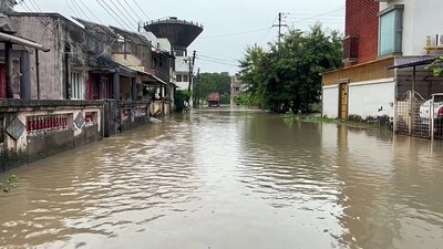 A view of a waterlogged street after incessant rainfall, in Navsari on Friday. (ANI Photo) A view of a waterlogged street after incessant rainfall, in Navsari on Friday. (ANI Photo)