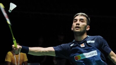 Lakshya Sen of India hits a return against Koki Watanabe of Japan during their men's singles quarter final match in the fourth day of the Japan Open (AFP) Lakshya Sen of India hits a return against Koki Watanabe of Japan during their men's singles quarter final match in the fourth day of the Japan Open (AFP)