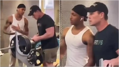 John Cena poses for a picture with fan during workout (TikTok) John Cena poses for a picture with fan during workout (TikTok)