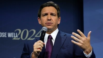 FILE - Republican presidential candidate Florida Gov. Ron DeSantis speaks during the Family Leadership Summit, July 14, 2023, in Des Moines, Iowa. Civil rights activists cheered when Ron DeSantis pardoned four Black men wrongfully convicted of rape as one of his first actions as Florida's governor. But four years later, as DeSantis eyes the presidency, their hope that the Republican would be an ally on racial justice has long faded. (AP Photo/Charlie Neibergall, File) (AP) FILE - Republican presidential candidate Florida Gov. Ron DeSantis speaks during the Family Leadership Summit, July 14, 2023, in Des Moines, Iowa. Civil rights activists cheered when Ron DeSantis pardoned four Black men wrongfully convicted of rape as one of his first actions as Florida's governor. But four years later, as DeSantis eyes the presidency, their hope that the Republican would be an ally on racial justice has long faded. (AP Photo/Charlie Neibergall, File) (AP)