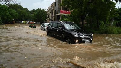 Gurugram, India-July 28, 2023 : Vehicle drive through a waterlogged stretch after heavy monsoon rains at sector-45 road near Greenwood city, in Gurugram, India, on Friday, 28 July 2023: (Photo by Parveen Kumar/Hindustan Times) Gurugram, India-July 28, 2023 : Vehicle drive through a waterlogged stretch after heavy monsoon rains at sector-45 road near Greenwood city, in Gurugram, India, on Friday, 28 July 2023: (Photo by Parveen Kumar/Hindustan Times)