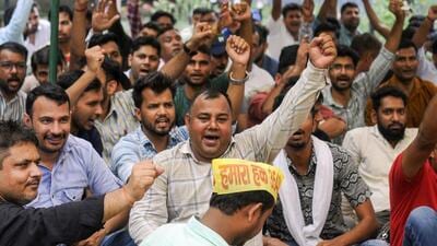 Haryana government clerks sitting on protest in Gurugram on Friday. (HT Photo)