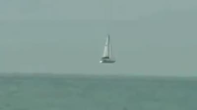 Optical illusion of a boat 'flying.' (Twitter/@Rainmaker1973) Optical illusion of a boat 'flying.' (Twitter/@Rainmaker1973)