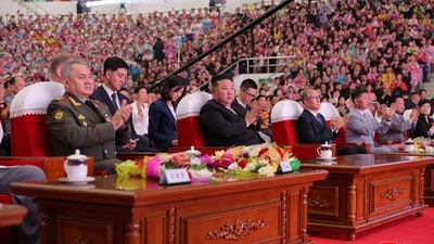 North Korean leader Kim Jong Un (C), with Chinese Communist Party politburo member Li Hongzhong (4th R) and Russian Defence Minister Sergei Shoigu (L), attending the parade. (AFP) North Korean leader Kim Jong Un (C), with Chinese Communist Party politburo member Li Hongzhong (4th R) and Russian Defence Minister Sergei Shoigu (L), attending the parade. (AFP)